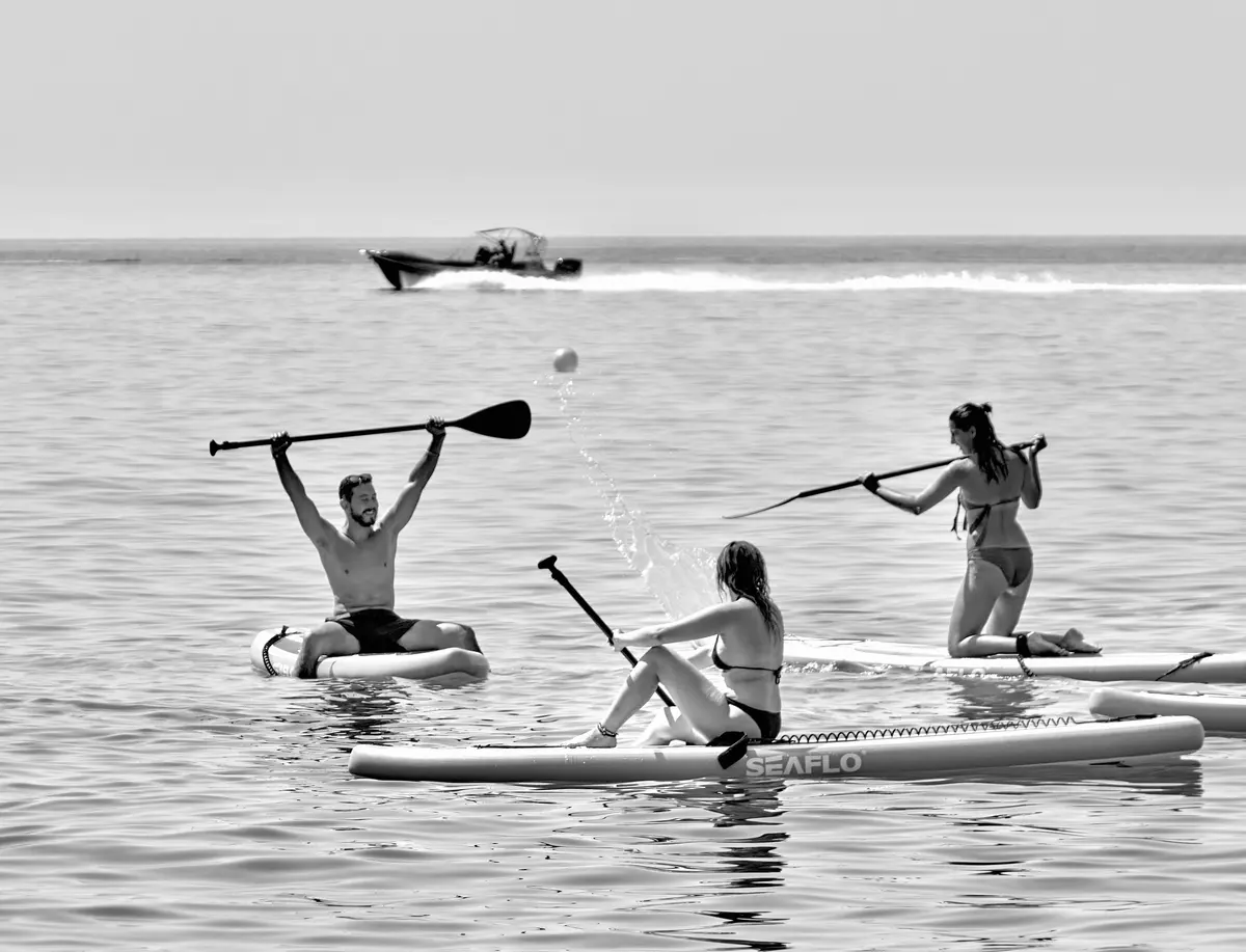 Corporate group taking part in a local water activity during a team-building day